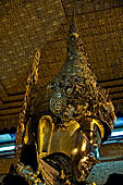 Myanmar's most famous Buddha image, 13ft high and covered in 6 inches of pure gold leaf, Mahamuni Paya, Mandalay, Myanmar  